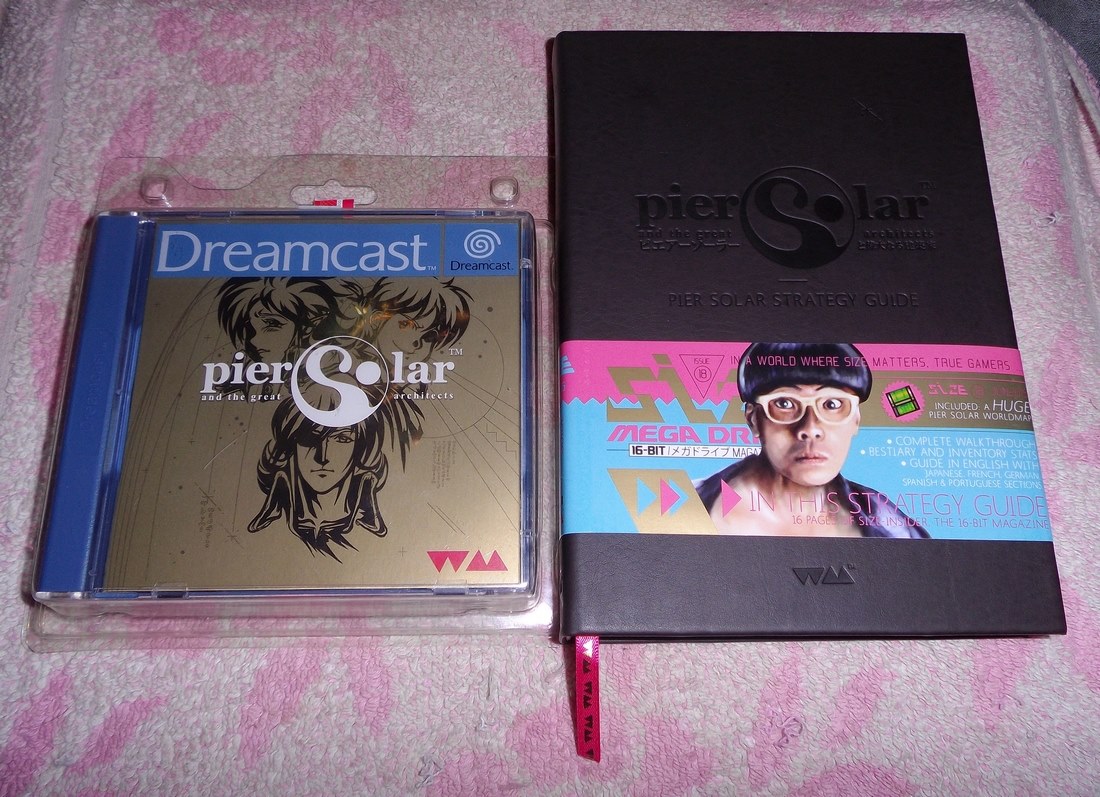 Pier Solar sur Dreamcast sous scellé, avec le guide officiel.